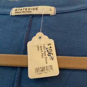 Brand new, excellent condition, Cotton dress. Very pretty blue.